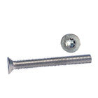 1852 maskinskrue Torx 6 x 60 A4, set fra siden med pakke på bord
