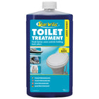 Star Brite toilet væske i 946 ml flaske, står på bord i båd.