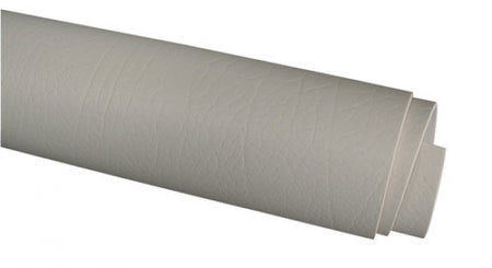 SeaTec indretningsmateriale i beige, rullet op på en sort baggrund
